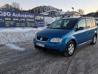Begagnad VW Touran 150 HK (110 kW) 2005 Blå Minibuss