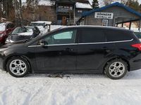 Begagnad Ford Focus Titanium 125 HK (91 kW) 2014 Svart Kombi