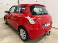 Begagnad Suzuki Swift 94 HK (69 kW) 2010 Röd Halvkombi