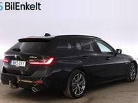 Begagnad BMW 330e Sport Line 184 HK (135 kW) 2021 Svart Kombi