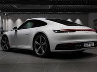 Begagnad Porsche 911 Carrera S 450 HK (330 kW) 2020 Carrara white metallic Sportkupé