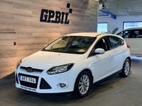Begagnad Ford Focus Titanium 101 HK (74 kW) 2014 Vit Halvkombi
