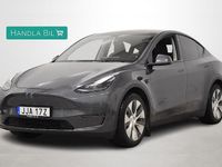 Begagnad Tesla Model Y Long Range AWD 378 kW (514 HK) 2023 Grå SUV