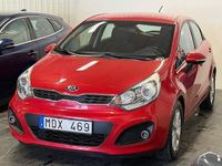 Begagnad Kia Rio 109 HK (80 kW) 2011 Röd Halvkombi