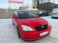 Begagnad Toyota Corolla 97 HK (71 kW) 2003 Röd Halvkombi
