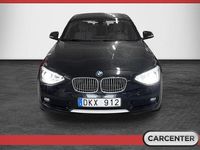 Begagnad BMW 118 Urban Line 143 HK (105 kW) 2012 Svart Halvkombi