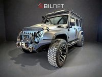 Begagnad Jeep Wrangler Unlimited Sahara 200 HK (147 kW) 2012 Grå SUV