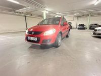 Begagnad Suzuki SX4 120 HK (88 kW) 2011 Röd Halvkombi