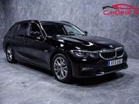 Begagnad BMW 330e Sport Line 184 HK (135 kW) 2021 Svart Kombi