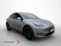 Begagnad Tesla Model Y Long Range AWD 378 kW (514 HK) 2023 Grå SUV
