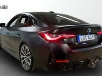 Begagnad BMW M440 M Sport 374 HK (275 kW) 2021 Röd folierad svart Sedan