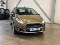 Begagnad Ford Fiesta Titanium 82 HK (60 kW) 2013 Brun Halvkombi