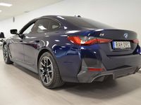 Begagnad BMW i4 Shadowline 400 kW (544 HK) 2023 Blå/lila Sedan