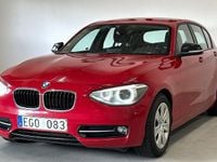 Begagnad BMW 118 Sport Line 143 HK (105 kW) 2011 Röd Halvkombi