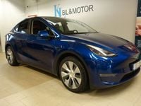 Begagnad Tesla Model Y Long Range AWD 378 kW (514 HK) 2021 Blå (blåmetallic) SUV