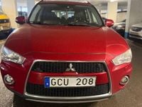 Begagnad Mitsubishi Outlander 156 HK (114 kW) 2011 Mörkröd SUV