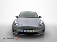 Begagnad Tesla Model Y Long Range RWD 255 kW (347 HK) 2024 Grå SUV