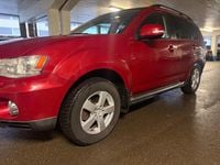 Begagnad Mitsubishi Outlander 156 HK (114 kW) 2011 Mörkröd SUV