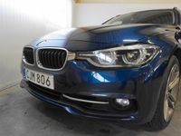 begagnad BMW 330 i xDrive Touring Aut, 252hk,