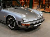 Begagnad Porsche 911 Carrera 231 HK (169 kW) 1987 Grå Cab