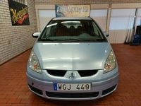 Begagnad Mitsubishi Colt 95 HK (69 kW) 2004 Blå Halvkombi