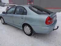 Begagnad Mitsubishi Carisma 122 HK (89 kW) 2003 Ljusgrönmetallic