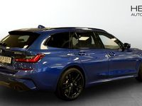 Begagnad BMW 330e Shadowline 2022 Blå Kombi