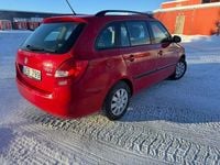 Begagnad Skoda Fabia 86 HK (63 kW) 2013 Röd Kombi