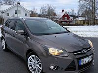 Begagnad Ford Focus Titanium 125 HK (91 kW) 2013 Brun Kombi