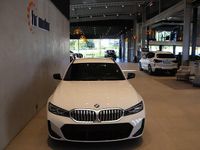 Begagnad BMW 330e M Sport 293 HK (215 kW) 2023 Vit Kombi