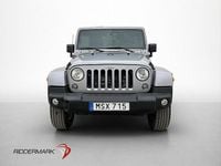 Begagnad Jeep Wrangler Unlimited Sahara 200 HK (147 kW) 2015 Grå SUV