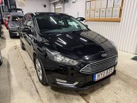 Begagnad Ford Focus Titanium 125 HK (91 kW) 2015 Svart Kombi