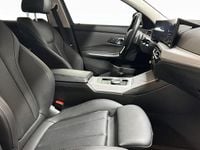 Begagnad BMW 330e Shadowline 2022 Svart Kombi