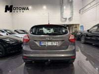 Begagnad Ford Focus Titanium 116 HK (85 kW) 2011 Brun Halvkombi