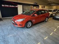 Begagnad Ford Focus 116 HK (85 kW) 2011 Orange Kombi