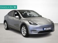 Begagnad Tesla Model Y Long Range AWD 378 kW (514 HK) 2023 Grå SUV