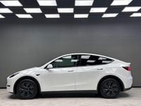 Begagnad Tesla Model Y Long Range AWD 378 kW (514 HK) 2024 Vit SUV