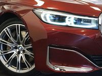 Begagnad BMW 745e Comfort Edition 394 HK (289 kW) 2021 Mörkröd Sedan