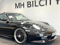 Begagnad Porsche 911 Carrera 4 301 HK (221 kW) 1999 Svart