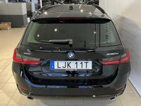 begagnad BMW 328 330e xDrive Touring Nav Fartpilot HiFi Sportstol Drag 2023, Kombi