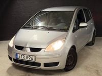 Begagnad Mitsubishi Colt 95 HK (69 kW) 2006 Silver Halvkombi