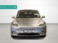 Begagnad Tesla Model Y Long Range AWD 378 kW (514 HK) 2023 Grå SUV