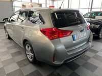 begagnad Toyota Auris Touring Sports Hybrid e-CVT