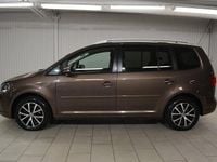 Begagnad VW Touran Comfortline 105 HK (77 kW) 2013 Brun Minibuss