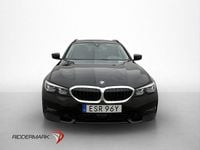 Begagnad BMW 330e Sport Line 184 HK (135 kW) 2021 Svart Kombi