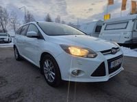 Begagnad Ford Focus Titanium 125 HK (91 kW) 2012 Vit Kombi