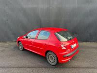 Begagnad Peugeot 206+ 75 HK (55 kW) 2010 Röd Halvkombi