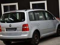 begagnad VW Touran 2.0 FSI Sv-såld 7-sits | DEFA värmare