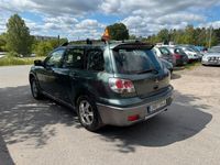 Begagnad Mitsubishi Outlander 161 HK (118 kW) 2003 Mörkgrön SUV