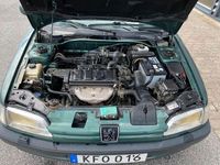 Begagnad Peugeot 306 Roland Garros 88 HK (64 kW) 1995 Mörkgrön Halvkombi